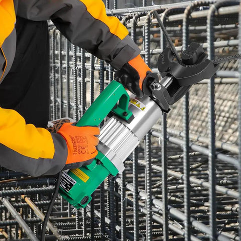 Hoteche 1500W Electric Rebar Bender 1 Inch Capacity Portable Steel Bar Bending Machine uses for bending rebar on construction site.