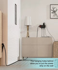2 Pack Surge Protector Power Strip with USB C and USB A Ports mounted on wall near cabinet in home