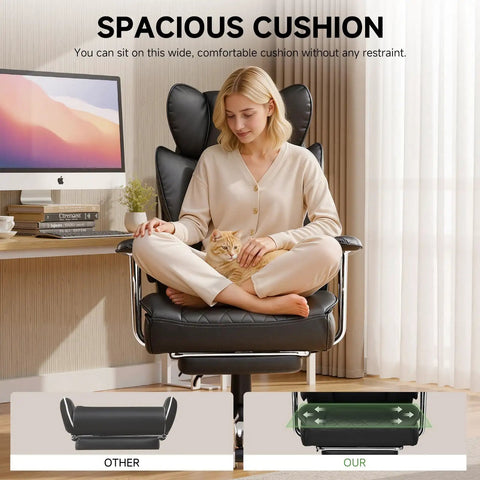 Woman sitting cross-legged on Big And Tall Leather Office Chair With Footrest High Back Ergonomic Gaming Chair Pocket Spring Lumbar Support And Outward Fixed Soft Armrests For Executive Comfort And All Day Back Support, with a cat in her lap