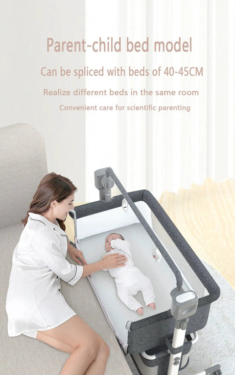 No Fuss Electric Bluetooth Bedside Crib For Babies, Co Sleeper Bassinet with soft mattress and parent beside baby.