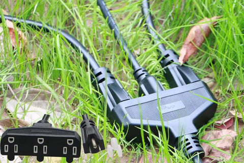 Heavy Duty 3 Outlet Outdoor Extension Cord 10 Ft 14 AWG 15 Amp Waterproof Power Strip With 3 Prong Plug on grass.