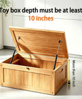 Wooden box with open lid supported by 2 Pack 15 Inch Soft Close Toy Box Hinges With Gas Strut Safety Lid Support in room