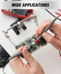 Two Piece Multimeter Test Probes Kit With Ultra Sharp Alloy Tips CAT III 1000V 20A Leads testing a circuit board
