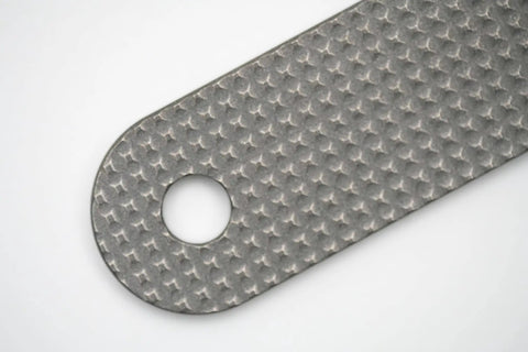 Close-up of textured Ultra Slim Pry Bar Keychain Tool Pocket Titanium Multitool for Everyday Carry with smooth gripped edge.