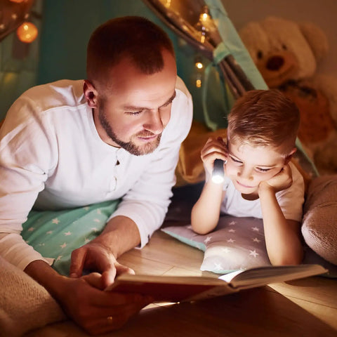 Father and son reading with Ultra Bright 500 Lumen Pocket Pen Light With Clip, AAA Powered Mini Flashlight For Quick Inspections, Repairs