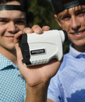 Person holding Bang For Your Buck Budget Friendly Golf And Hunting Rangefinder With Seven X Magnification, 1200 Yard Distance outdoors