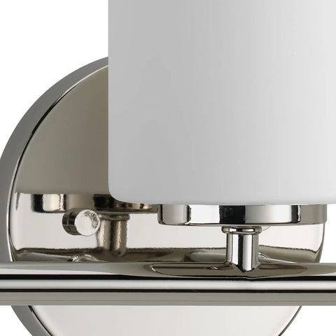 Close-up of nickel finish on Three Light Etched Glass Modern Bath Vanity Light, Replay Collection, showing backplate and support arm.