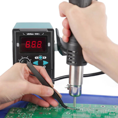 959D I Digital Hot Air Rework Station in use on a circuit board, showcasing precise PID temperature control and quick heat up.