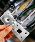 Close-up of Five Pack Iron L Shelf Brackets For 90 Degree Corners Heavy Duty Steel Corner Connectors, handheld view.