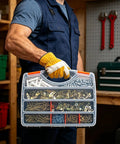 Person holding Heavy Duty Drywall Anchors And Screws Assortment Kit 600 Pieces Self Drilling Hollow Wall Plugs
