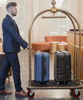 Hotel luggage cart with heavy duty 5 inch swivel casters set of 4 with polyurethane tread on polypropylene core, holding two suitcases