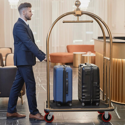 Hotel luggage cart with heavy duty 5 inch swivel casters set of 4 with polyurethane tread on polypropylene core, holding two suitcases