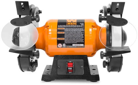 Heavy Duty Eight Inch Bench Grinder With A No Fuss Three Amp Motor And Soft Start Switch for sharpening tools at home.
