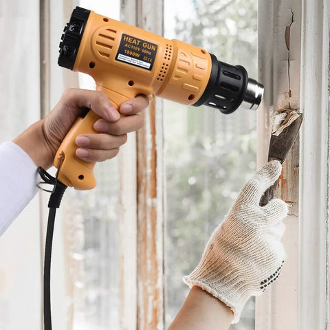 Beast 1800W Hot Air Heat Gun With Dual Temp Modes used for paint stripping, rapidly heats to 1202F 650C, shown in DIY task