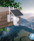 Rugged Solar Wireless Security Camera With 2.5K 4MP Clarity Outdoor Battery Powered 10000mAh 360 Degree PTZ on wood in rain