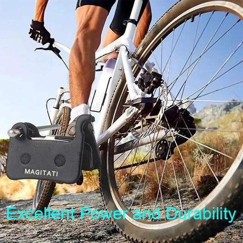 Cyclist on mountain bike with focus on 4 Pairs Organic Resin Disc Brake Pads For Mountain Bikes, Grippy Bite And Low Noise Stop