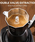 Stovetop Espresso Maker With Double Valve Tech Italian Moka Pot Brewed Fresh On Gas Or Electric Stove Top with brewed coffee.