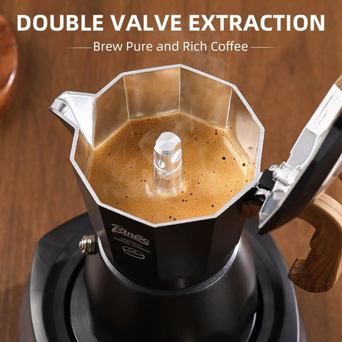 Stovetop Espresso Maker With Double Valve Tech Italian Moka Pot Brewed Fresh On Gas Or Electric Stove Top with brewed coffee.