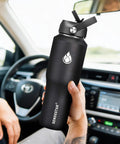 Built Tough 32 Oz Stainless Steel Water Bottle With Straw Cap And Wide Mouth Double Wall Vacuum Insulation Keeping drinks cool in car.