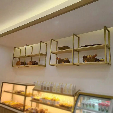 Heavy Duty Wall Shelf Brackets Black Metal Floating Supports Square Tube Wall Mounts Built Tight For Heavy Lifting With Mounting Screws Included Space Saving Rack Hardware No Wooden Plank Needed Three Pack Set displaying baked goods.
