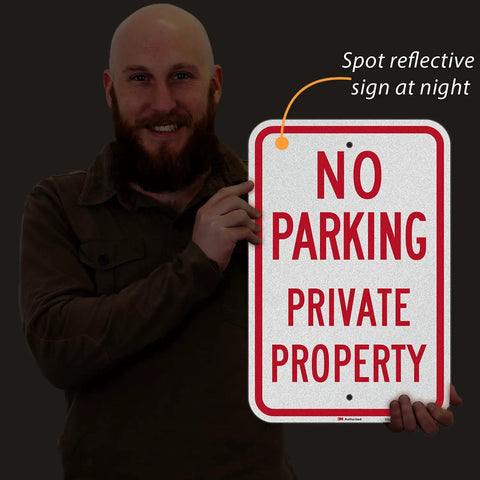 Tough As Nails No Parking Private Property Sign 12 X 18 Inch Heavy Duty Aluminum Sheet shown held by a man.