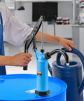 Straight Up Dead Simple Lever Action Drum Pump Fits 5 To 55 Gallon Barrels in use transferring liquid to container.