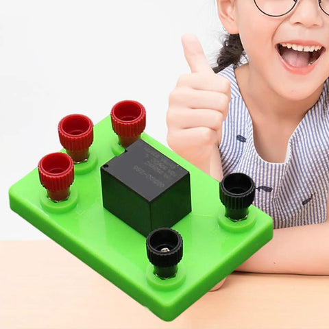 3V Electromagnetic Relay Experiment Kit For STEM Learning Hands On Science Projects held by smiling child showing thumbs up