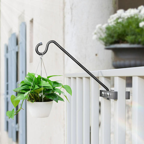 Heavy Duty Deck Hook Railing Bird Feeder Hanger With Rustproof Coating For Flower Baskets And Outdoor Patio Decor Built Like A Tank With Zero Drill Install Holds Twenty Two Pounds No Sweat Setup holding a plant on a railing.