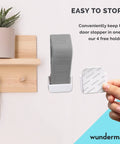 Heavy Duty Door Stopper Set Of 3 Rubber Wedges For Carpet, Hardwood, Concrete And Tile shown in wall holder