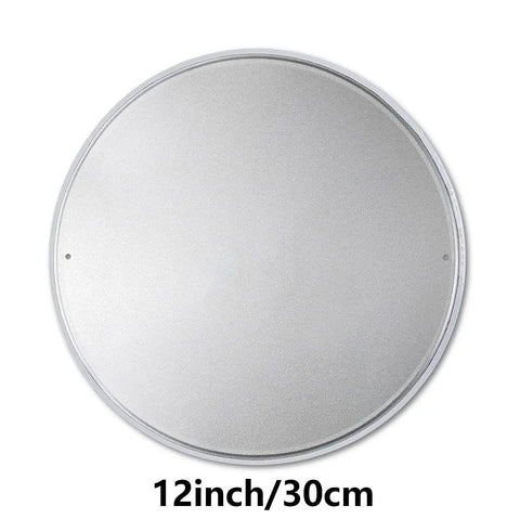Back view of 12 Inch Round Watch Out For Tugger Traffic Circular Metal Tin Sign, pre-drilled holes for easy installation.