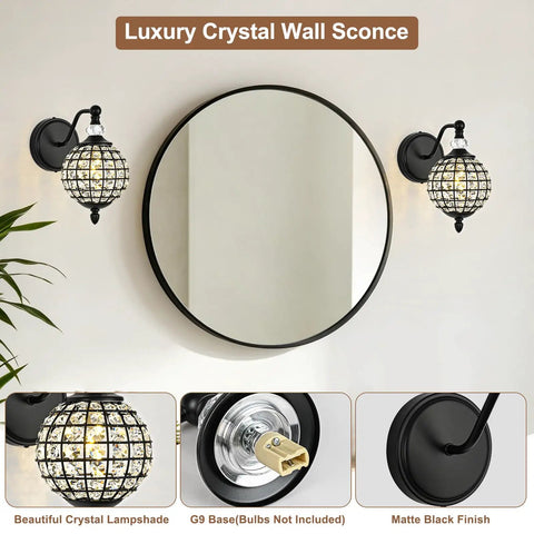Lumestary 1 Piece Black Crystal Globe Wall Sconce, 1-Light Matte Black Finish Wall Sconce for Bathroom Bedroom Living Room, Vintage Vanity Light beside a round mirror.