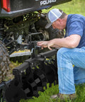 Beefy 34 Inch Disc Plow Harrow Heavy Duty With Adjustable Height And Wide Cut being attached to ATV with universal mount