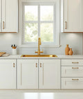 Modern kitchen with Antique Brass Aluminum Cabinet Handles 2 Pack With 5 Inch Hole Center Drawer Pulls on white cabinets.