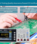 Testing circuit board with Your Go-To 55000 Counts Digital Multimeter With True RMS And Temperature Probe, lab and shop use.