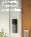 Premium Battery Powered Smart Doorbell Camera with Crisp Retinal 4K Footage mounted near a door with greenery.