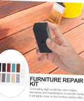 Hand holding a wax block from a DIY Floor Repair Kit For Cracked Tiles And Surfaces With Wax Block, Quick Heat Technology.
