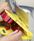 Crown Molding Cuts Made Super Easy With This Solid Miter Saw Jig adjusting yellow jig for precise 38 45 and 52 degree crown molding cuts.