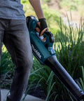 Renewed Brushless Cordless Leaf Blower held by user, showcasing ergonomic grip, designed for efficient yard work.
