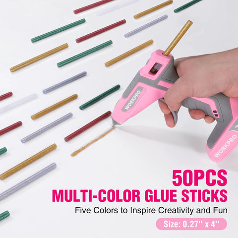 Person using Cordless Dual-Temp Hot Glue Gun Kit with 50 colorful mini glue sticks included for DIY crafting projects.