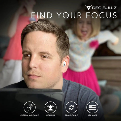 Man wearing 25 Decibel Noise Reduction Earplugs Custom Molded Reusable Hearing Protection for Noise Sensitivity and Flights