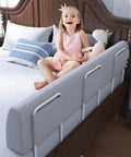Zero Wiggle Toddler Bed Bumper With Comfy Foam Padding Kid Approved Safety Guard Rail Works Perfect On Twin Full Queen King Beds Grey 59 Inch Frame with a child sitting on a bed.