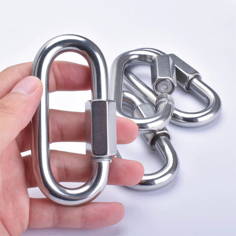 Hand holding Alele 10Mm Stainless Steel 3 By 8 Inch Quick Links 4 Pack, showing D shape and locking mechanism