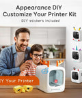 Father and child assembling AI Powered 3D Printer For Kids With 8 PLA Filament Set And AI Design App, DIY stickers included.