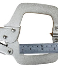 Close-up of a No Sweat Grip Locking C Clamp Pliers Set Of Four 11 Inch Swivel Jaw Welding Clamp with measuring ruler.