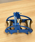Beefy Heavy Duty Cable Pulley Roller Guide Block With Grooved Steel Wheels Three Wheel System For Tight Turns 130 100mm Compact Mechanical Build Rugged Steel Frame Low Friction Sheave blue steel cable guide block with three grooved wheels on wood surface