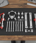 Upgrade Your 1/16 Rc Crawler With This High Strength Red Damping System Link Set That Brings Serious Grip And Smoothes Out Rough Terrain For A Sick Ride Anywhere - Red and silver metal link kit components.