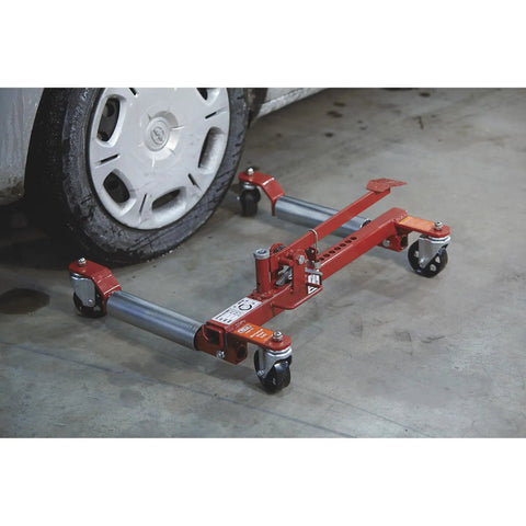 Heavy Duty Mechanical Wheel Dolly With Hands Free Pedal Lift Crushing Up To 1250 Lbs Rock Solid Steel Frame Smooth Rolling Casters Top Shelf Garage Essential For Easy Street Car Transport