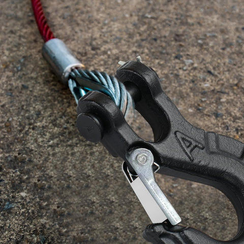 Beefy Heavy Duty Forged Steel Clevis Slip Hook For Winch Cables And Ropes Five Sixteenth Inch Extreme Hook Black on concrete