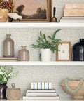 Shelves with decor items against Beige Grasscloth Peel And Stick Wallpaper Self Adhesive Vinyl For Walls 17.7 X 118.1 Inches Textured Faux Linen Look Removable Wall Covering Durable Vinyl Easy Install No Fuss Decorating.
