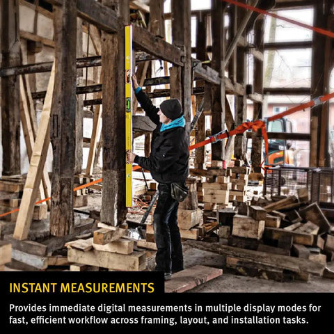 Heavy Duty Digital Spirit Level 9 Inch Torpedo Gauge With Dual Illuminated Lcd Displays IP67 Waterproof Dustproof Rugged Tool Built Tough For The Daily Construction Hustle And Dead Nuts Precision in use measuring vertical alignment in a construction site.